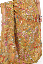 Woman wearing a colorful saree with a white background